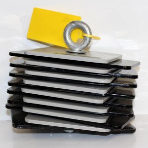 Stack of black and gray 3.5-inch floppy disks with a metal lock and yellow tag on top, symbolizing data security.