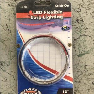 Packaged LED flexible strip lighting, 12" red, stick-on, coiled inside clear plastic, on boating-themed card.